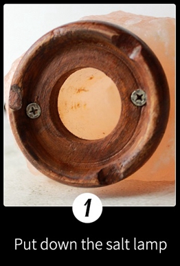 himalayan salt lamp with wooden base